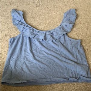 Sleeveless top. Light blue/periwinkle.